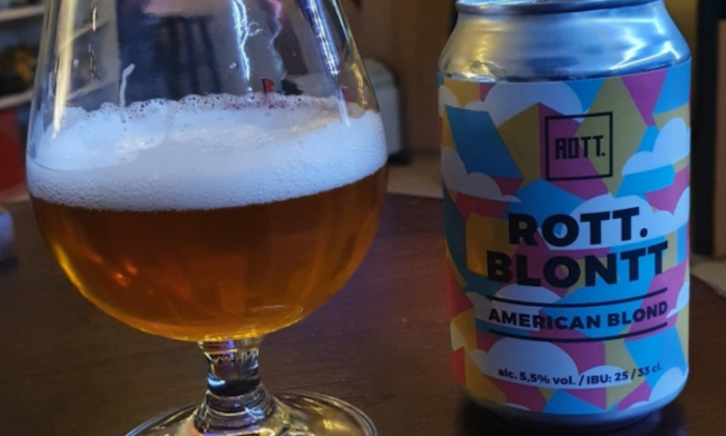 Rott blontt blikje en glas bier